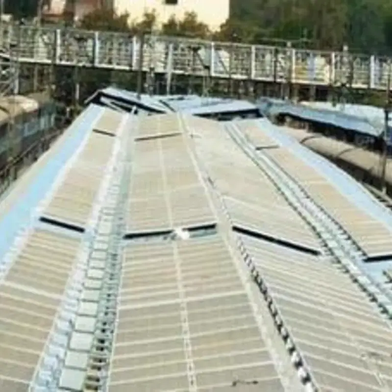 Solar panels on tin / metal sheet industrial factory roof