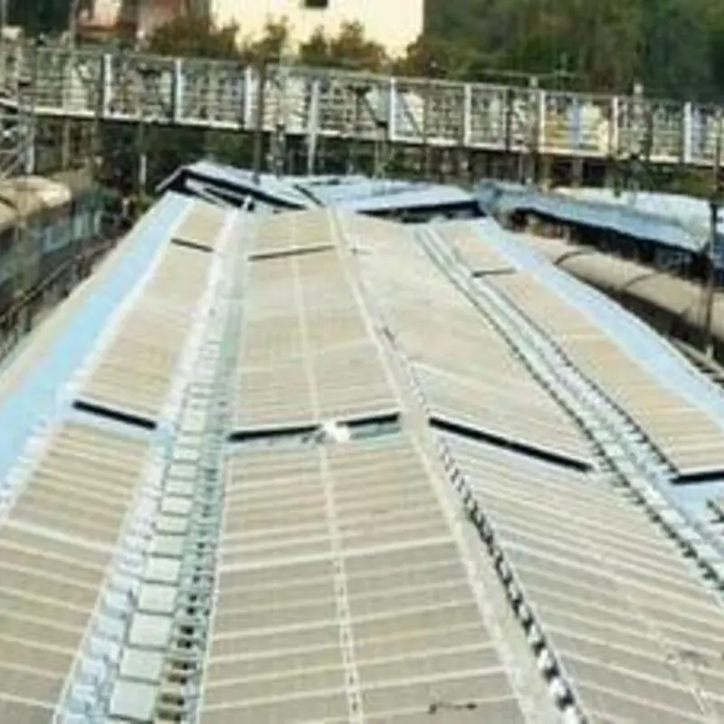 Solar panels on tin / metal sheet industrial factory roof — solar mounting structures